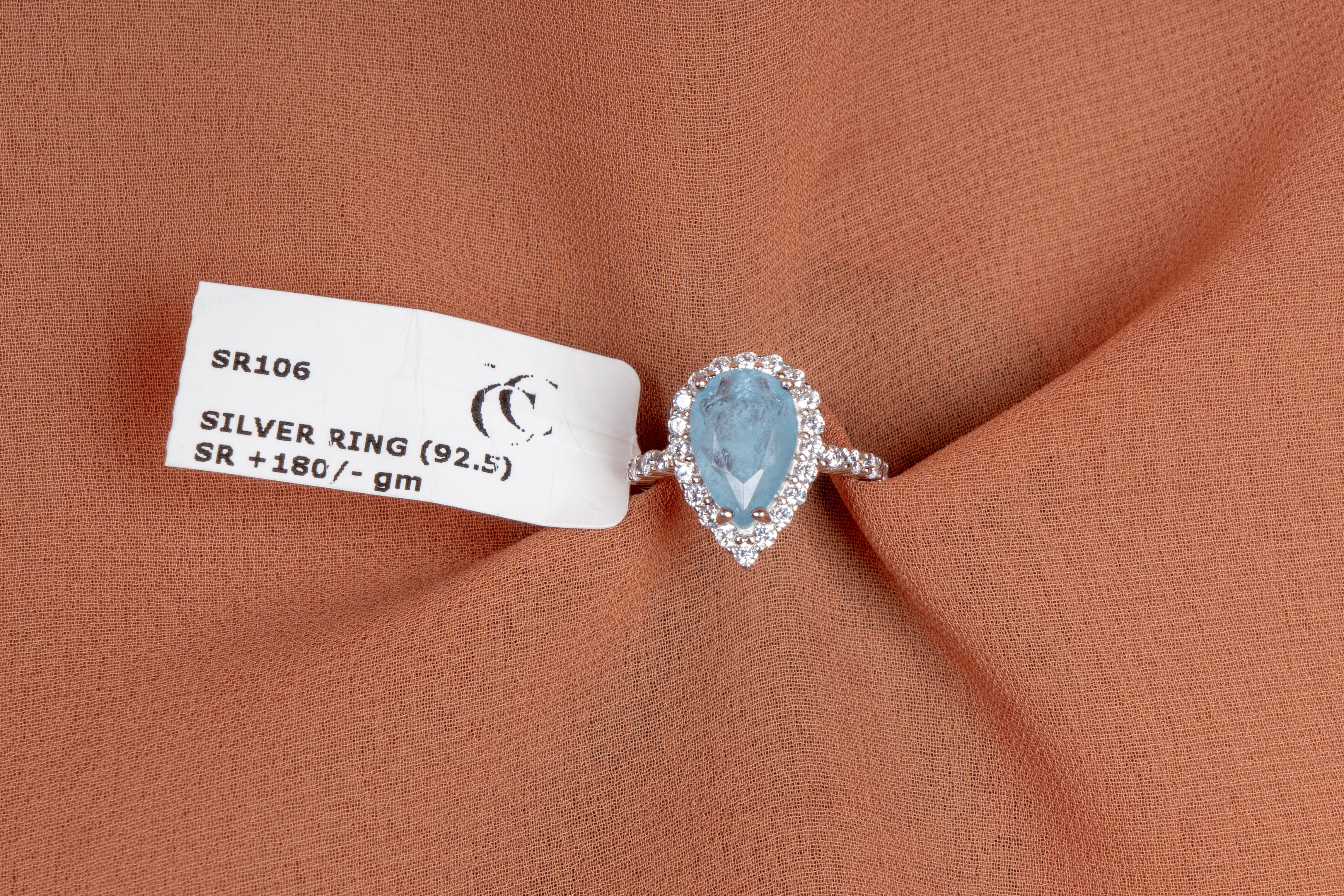 Maris Aqua Pear Halo Ring