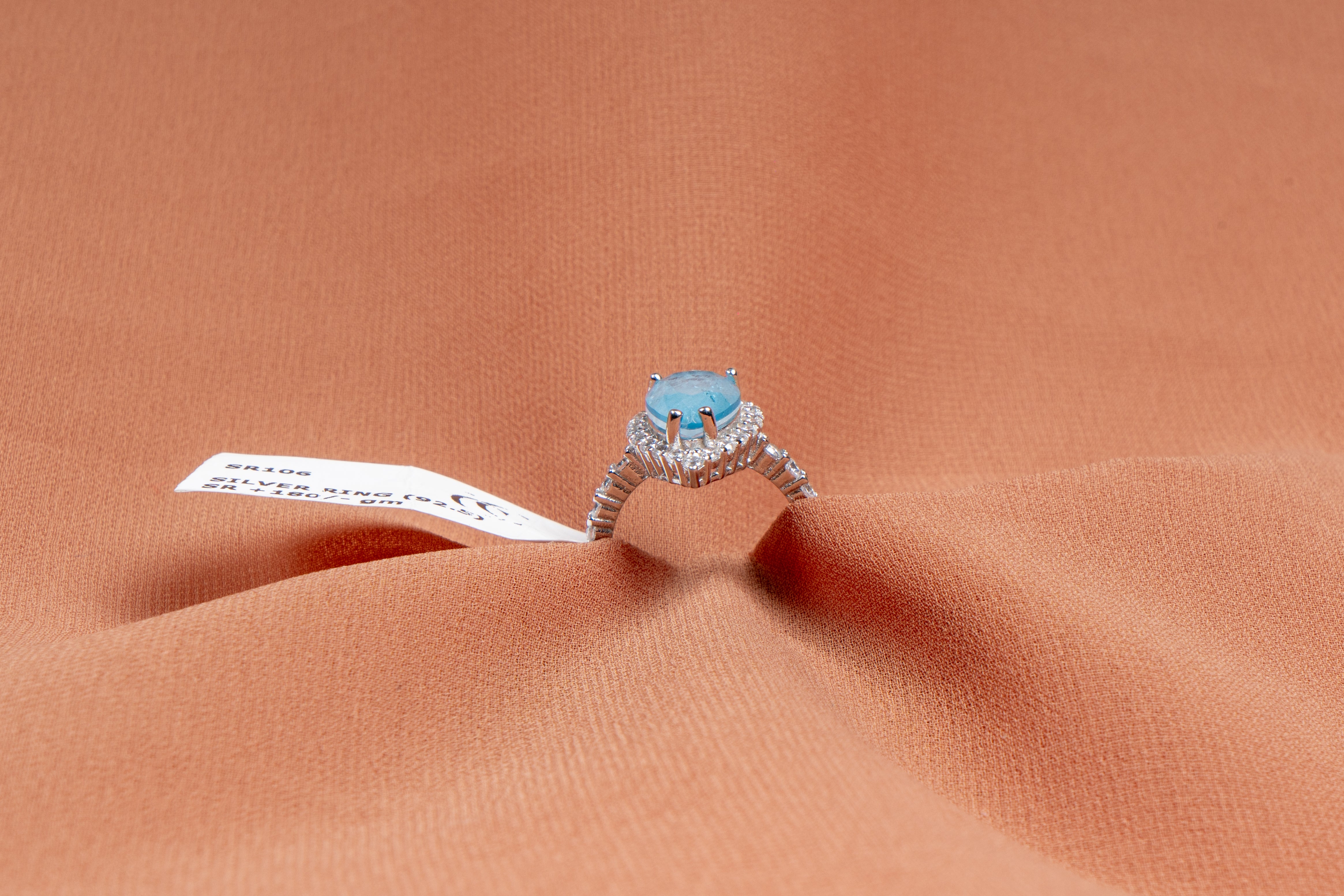 Maris Aqua Pear Halo Ring